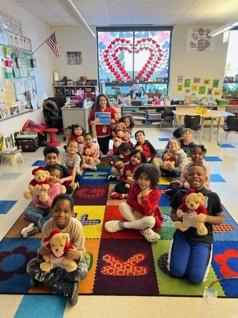 Cheston Elementary School in Easton class holding donated Godiva teddy bears