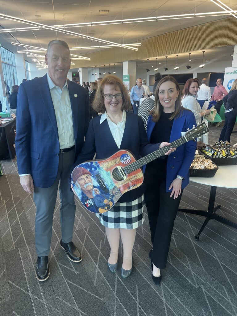 Martin Guitar valued at $1,799, presented to Kelly Blanar of Air Products