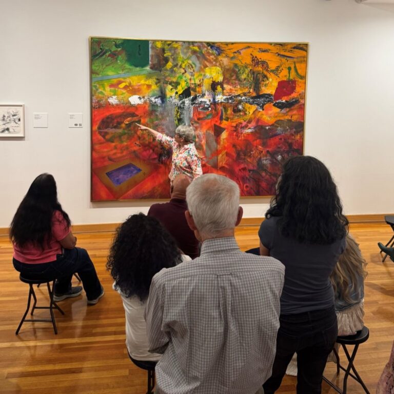 Participants view a painting at the Creative Caregiving through the Arts While Living with Dementia event at Lehigh University Art Galleries