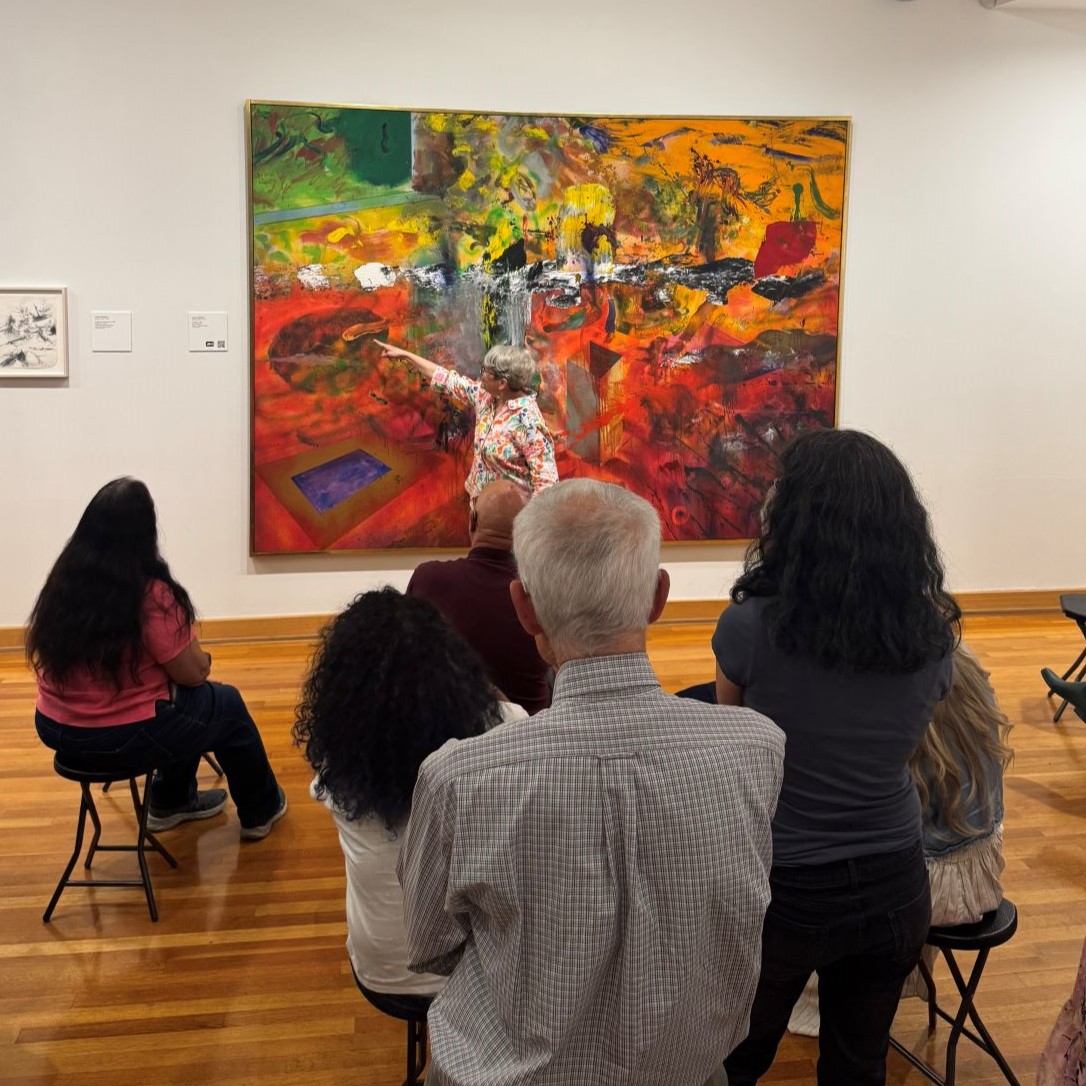 Participants view a painting at the Creative Caregiving through the Arts While Living with Dementia event at Lehigh University Art Galleries
