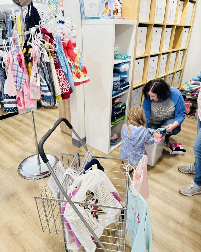 The Kindness Project volunteer connecting with a child